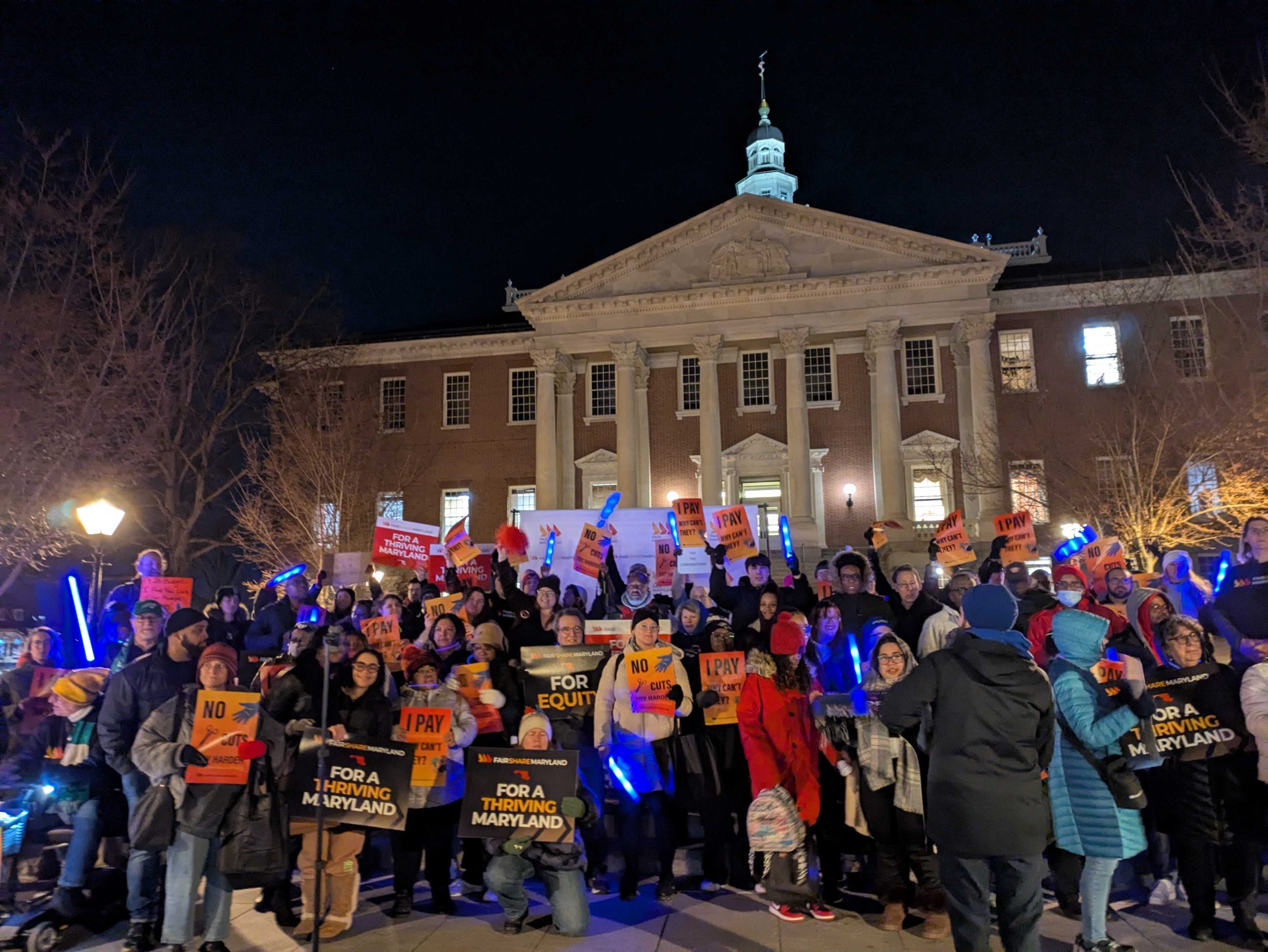 1000021552 Immigrant justice rally outside the state capitol at night