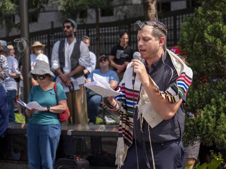 JUFJ leader Rabbi Tyler Dratch recites The Amidah during our Tisha B'Av event.
