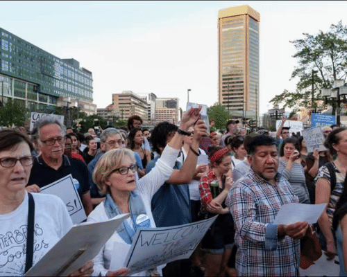 copy_9551b4f5-1d80-4a79-bf18-749882e6af27 GIF of JUFJers protesting at immigrant justice rallys