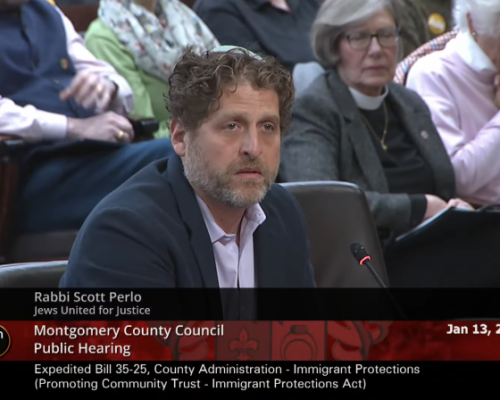 rabbi-scott-perlo-testifying-moco-trust-act Rabbi Scott Perlo testifying in front of the Montgomery County Council